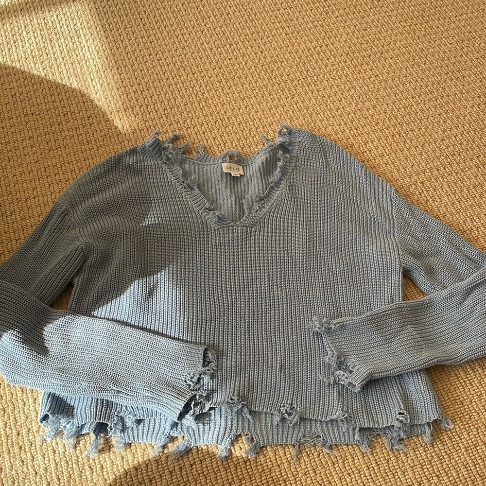 Distressed sweater